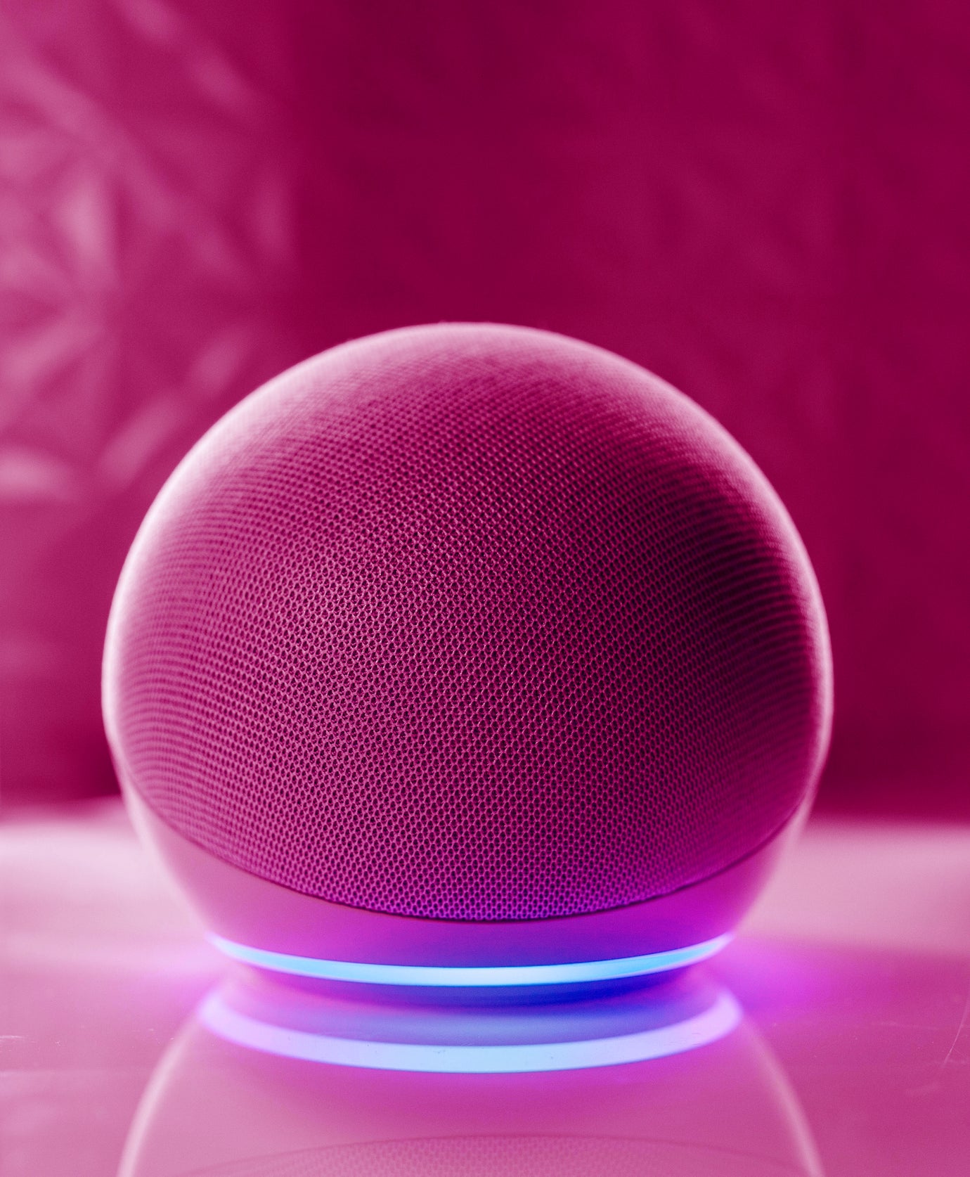 A portable spherical speaker with glowing light